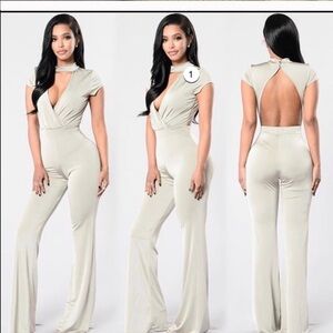 NWT! Fashion nova flared bell bottom Surplice jumpsuit in a muted olive color XS